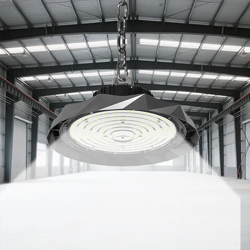 GF3 UFO LED High Bay Light Side View Showing Faceted Aluminum Heat Sink Body and Steel Eye Hook for Industrial High Bay Suspension Mounting