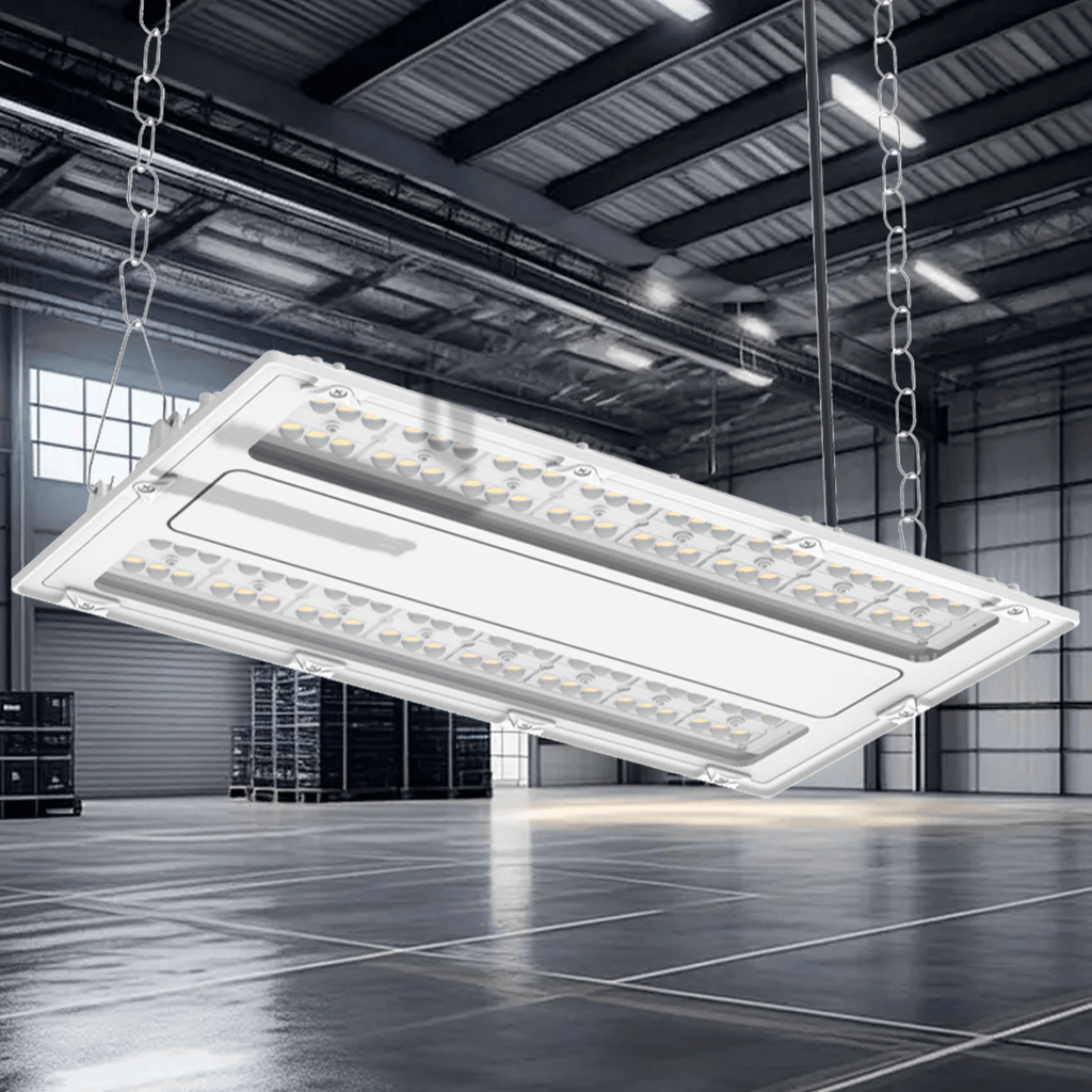 AEH2 LED Linear High Bay Light Angled Bottom View in Industrial Warehouse Showing Two-Row SMD LED Module Array with Clear PC Lens and Chain Suspension for High Bay Ceiling Mounting