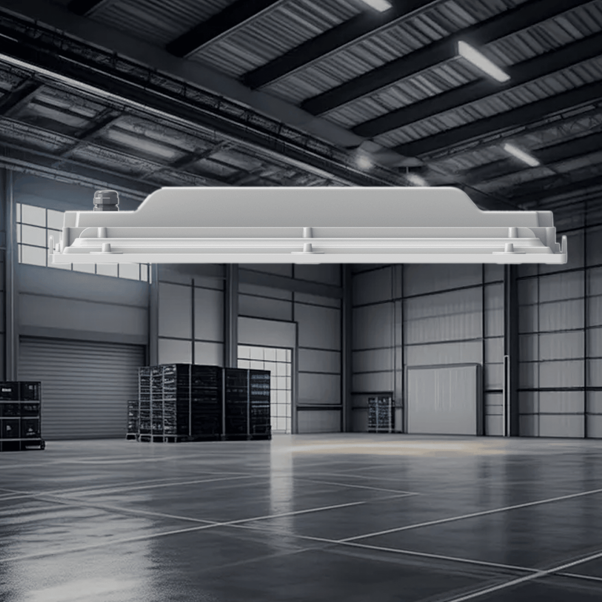 AEH2 LED Linear High Bay Light Side Profile View in Industrial Warehouse Showing Ultra-Slim Housing with Central Driver Box and Surface Ceiling Mount for Factory and Warehouse Lighting