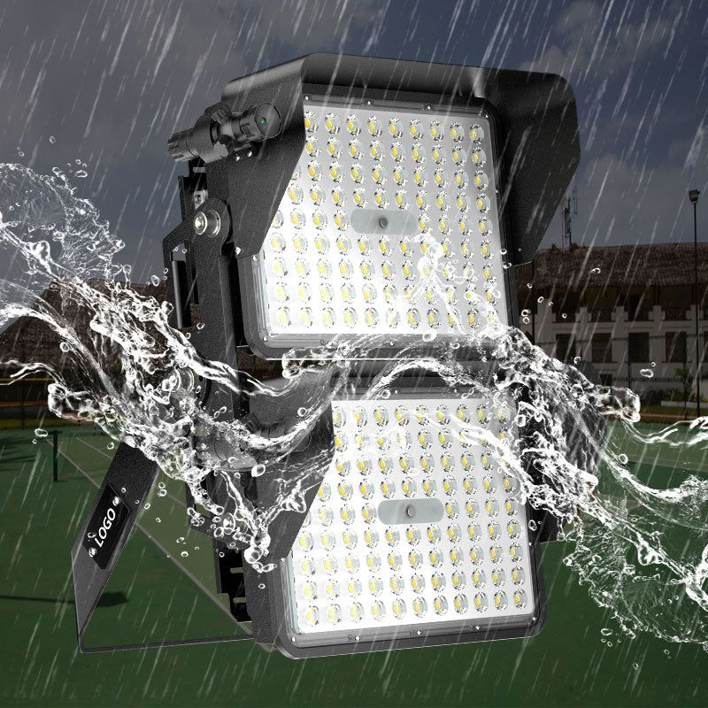 LED flood light in rain with water splashes, durable black die-cast aluminum housing, ideal for outdoor sports fields, SKU: LS4