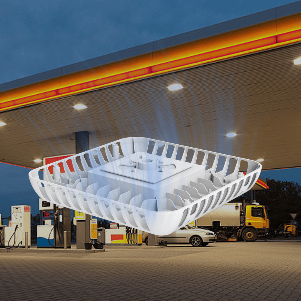 AEH6 LED Gas Station Canopy Light Rear Isometric View Suspended Against Dusk Gas Station Canopy Interior Background Showing Square White Aluminum Louvered Heat Sink Housing with Center Five-Point Mounting Hub for Petrol Station Ceiling Flush Mount
